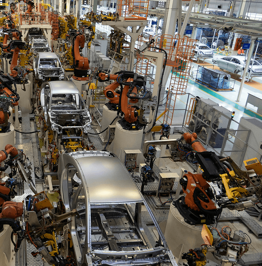 Automotive assembly line with robotic arms
