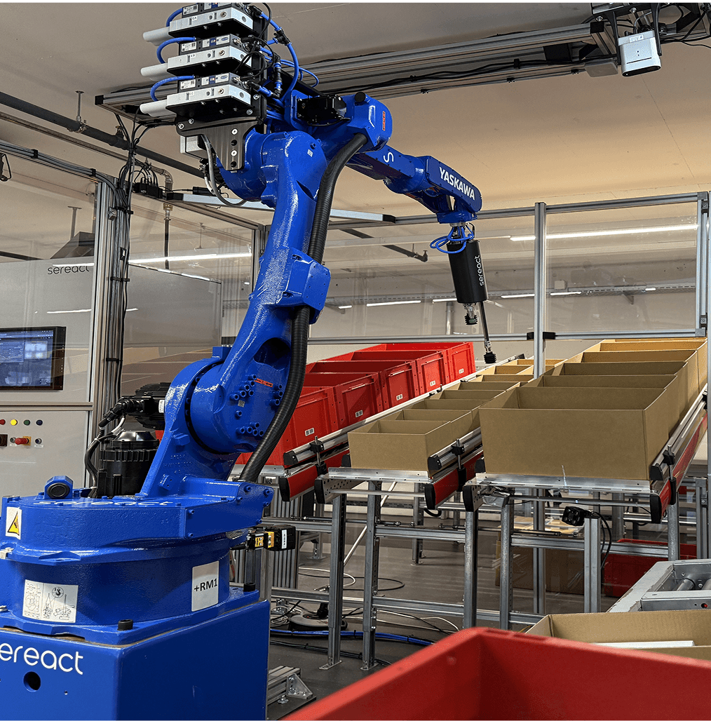 Blue robotic arm in warehouse logistics setting