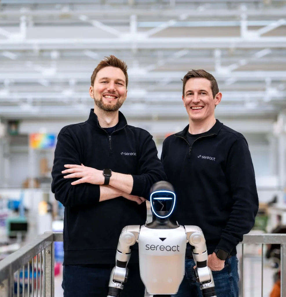 Ralf Gulde and Marc Tuscher with robot